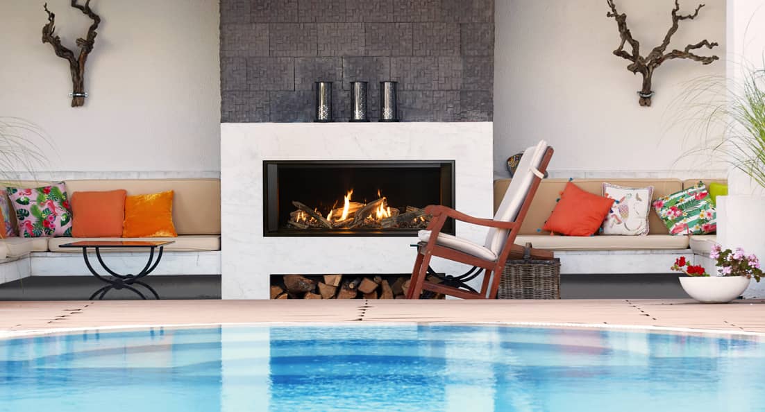 Outdoor Gas Fireplace with a Pool